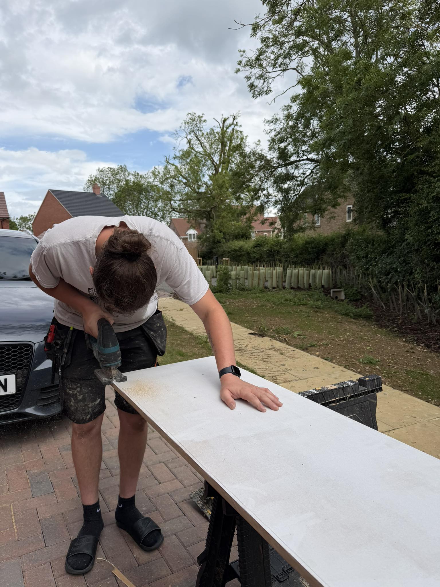 Timber being trimmed for a wooden cabinet
