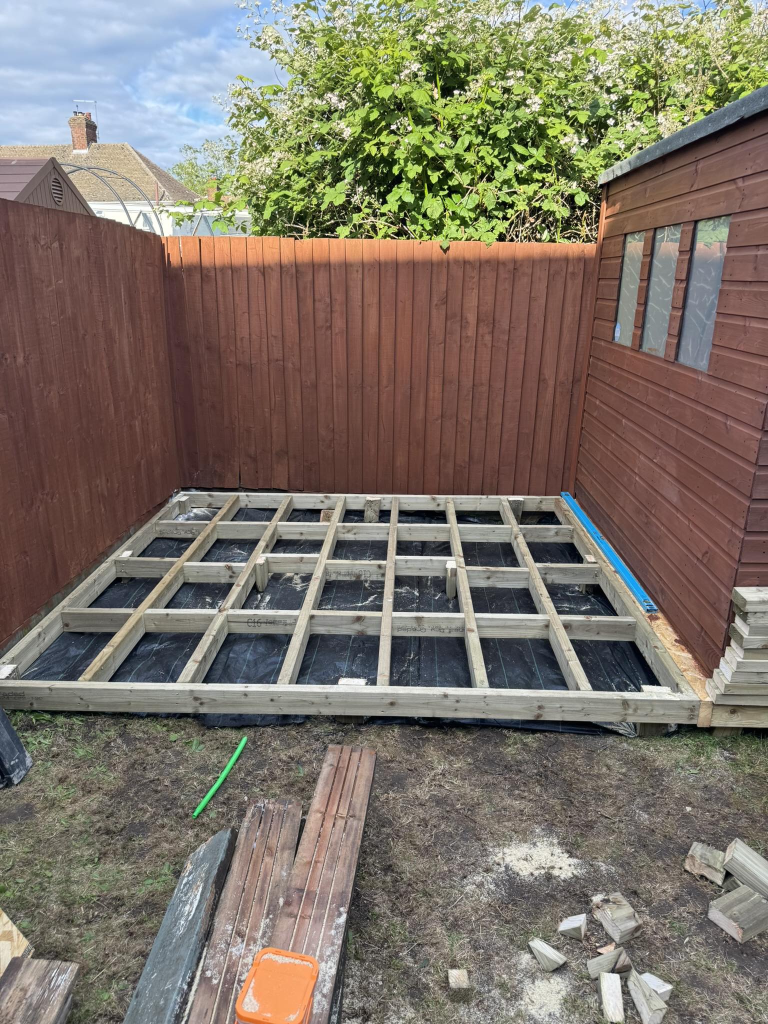 Decking frame under construction in a garden